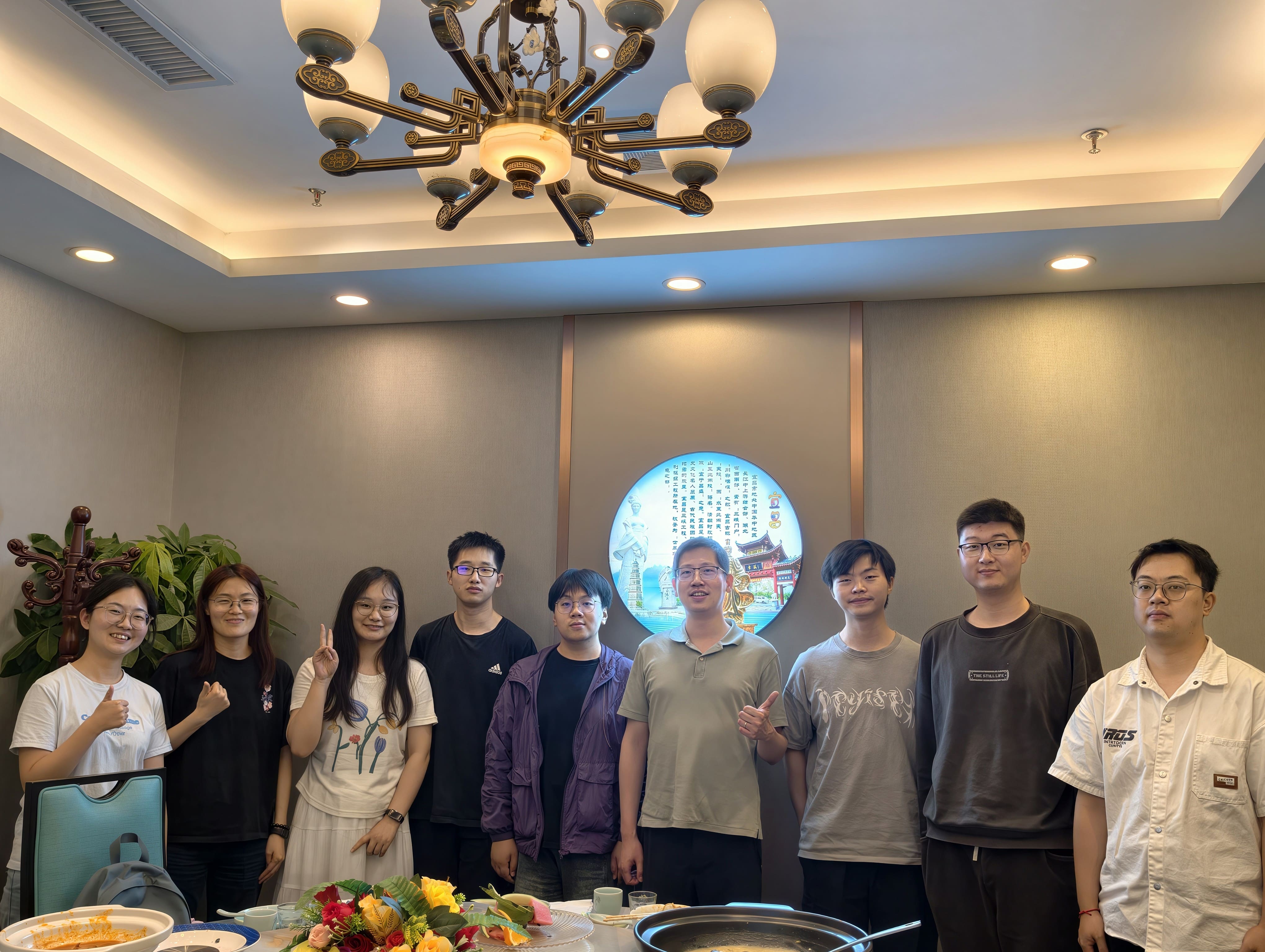 A joyful group dinner celebrating Li Liu’s graduation. (2026/06)